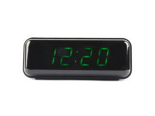 Digital alarm clock showing 12:20 o'clock on white background
