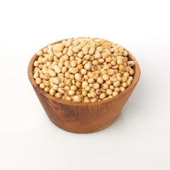 Isolated in White Background, a Wooden Bowl Filled With Raw Yellow Soybeans Presenting Natural Textures and Smooth Surfaces