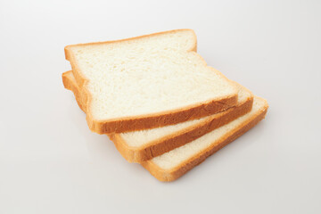 Slices of Bread Isolated in White Background, Showcasing the Texture and Fresh Appearance of Soft Sandwich Loaves