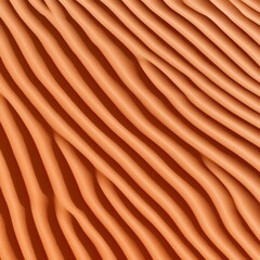 Captivating view of wavy sand dunes illuminated by soft natural light in a desert landscape showcasing fine textures and warm orange hues.