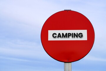 camping forbidden. forbidden sign with a written word inside.