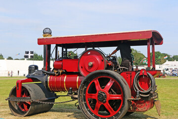 Vintage Steam Traction engine in a field	