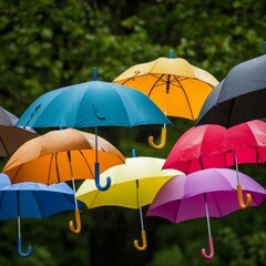 Obraz premium Colorful Umbrellas Floating in the Air on a Rainy Day, Green Background