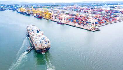 Container ships sail the seas carrying goods for sale all over the world.