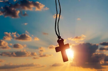 Cross at beautiful sunset, christianity and religion concept