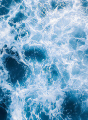 Fototapeta premium Deep Blue Sea Surface with Rippling Water and White Foam Patterns