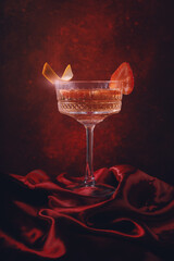 glass with cocktail and strawberrry