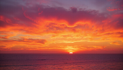 Naklejka premium Dramatic sunset over ocean horizon with vibrant hues, nature's beauty