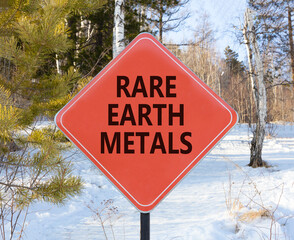 Rare earth metals symbol. Concept words Rare earth metals on beautiful red road sign. Beautiful...