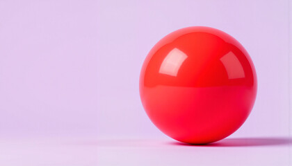 Glossy red ball reflecting light against pale violet background, aesthetics