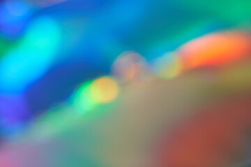 Vibrant abstract light bokeh with multicolor gradient blend for creative design.