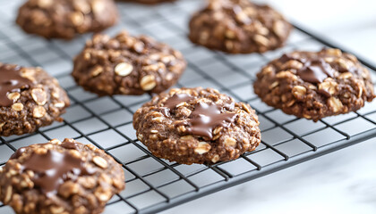 Flourless no bake peanut butter and oatmeal chocolate cookies on a cooling rack