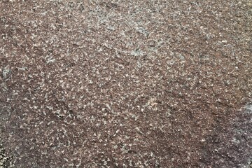 shabby wall of slum building on the street. Old concrete background. Dirty old concrete wall texture
