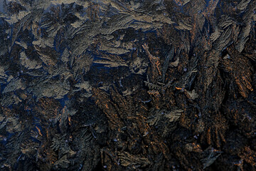 frost covered black polished granite