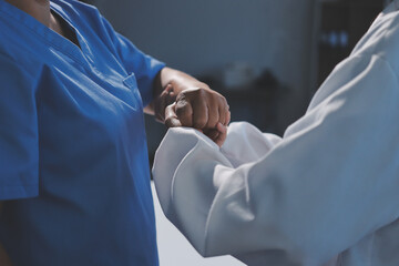 Orthopedist examining patient in hospital