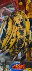 Plantains are a type of banana, but unlike sweet dessert bananas, they are starchy, firmer, and usually cooked before eating