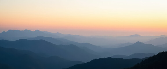 Fototapeta premium serene sunset over layered mountains