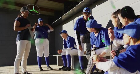 In school, baseball team in blue uniforms listening to coach with animation - Powered by Adobe