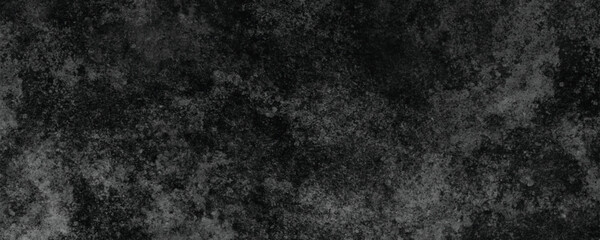 Fototapeta premium A Naturally Cracked and Eroded Dark Surface with Unique Abstract and Weathered Patterns