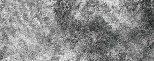 A Dark and Dramatic Grayscale Texture on a Gritty and Rough Concrete Wall

