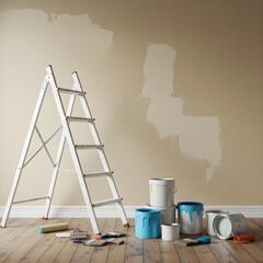 Scene of a painting project with open paint cans, rollers, and protective plastic covers