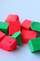 Paint for soy wax in the form of cubes, pink
paint, green paint