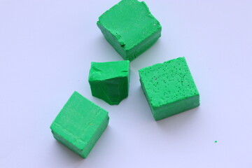 Soy wax paint in the form of cubes, green
paint, 