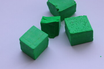 Soy wax paint in the form of cubes, green
paint, 