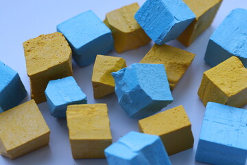 Paint for soy wax in the form of cubes, yellow 
paint, blue paint