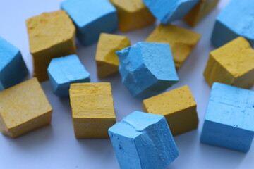 Paint for soy wax in the form of cubes, yellow 
paint, blue paint
