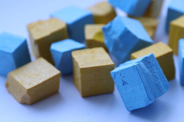 Paint for soy wax in the form of cubes, yellow 
paint, blue paint