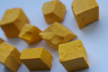 Paint for soy wax in the form of cubes, yellow 
paint