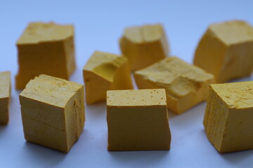 Paint for soy wax in the form of cubes, yellow 
paint