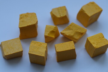 Paint for soy wax in the form of cubes, yellow 
paint