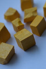 Paint for soy wax in the form of cubes, yellow 
paint