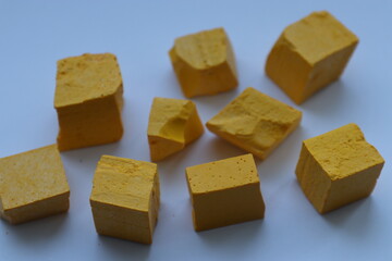 Paint for soy wax in the form of cubes, yellow 
paint