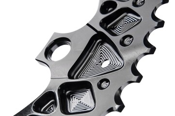 Close up of a black oval bicycle chainring against white isolated background. Professional bicycle...