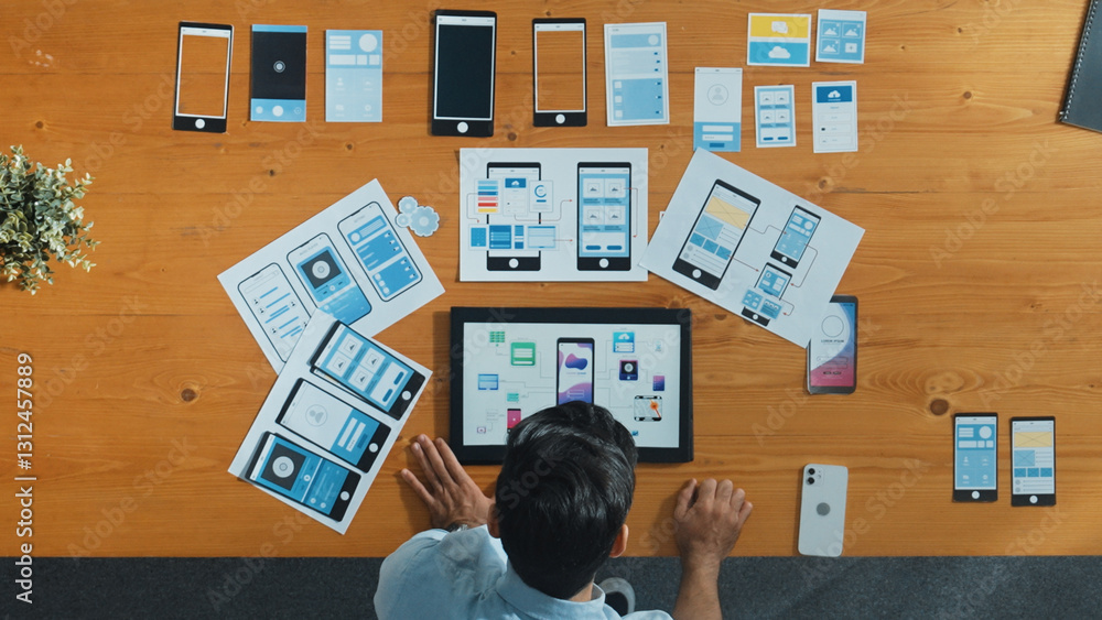 Poster top view of skilled developer walking and placing ux ui software. smart business man put tablet on m