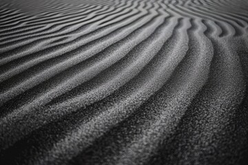 Striking black and white sand dunes, embodying abstract monochrome desert beauty