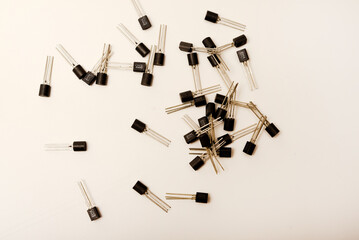 Old transistors on a white background. Electronic elements.