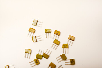 Old transistors on a white background. Electronic elements.