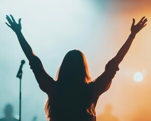 Easter Holiday, Easter Concept, Woman Silhouetted Arms Raised in Worship Concert Stage Lighting