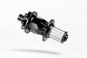 Obraz premium Black bicycle hub isolated on white background floating above the ground. Professional bike bearings.