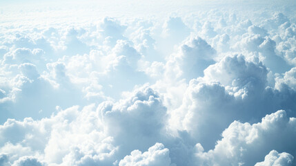 Fluffy white clouds forming a dreamlike aerial view