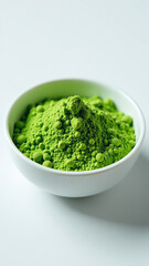 white bowl holds green powdered substance visually appealingly positioned easy inspection color