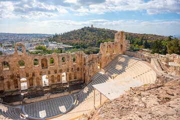 The Roman theater of Odeon of Herodes Atticus in the foreground and the Filopappou Hill in the...