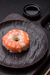 Donut shaped sushi rolls with salmon, shrimp and tuna