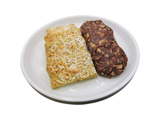 Homemade Protein Bars with Coconut and Chocolate Oats on a White Plate