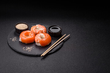 Donut shaped sushi rolls with salmon, shrimp and tuna