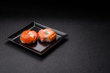 Donut shaped sushi rolls with salmon, shrimp and tuna